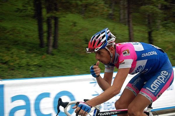 Alessandro Ballan soloed to victory on a rainy day.