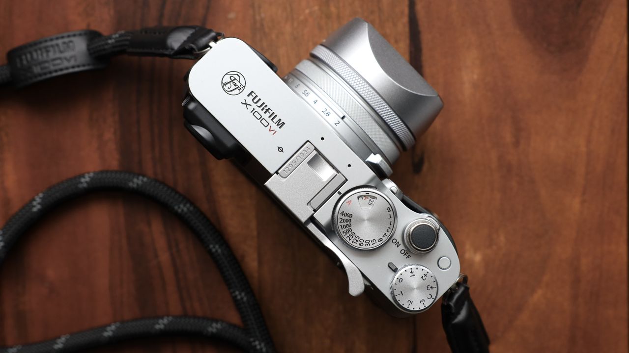 Fujifilm X100VI camera on a wooden table
