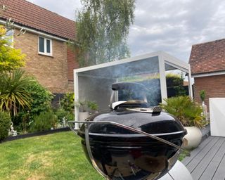 Weber Smokey Joe bbq in garden cooking