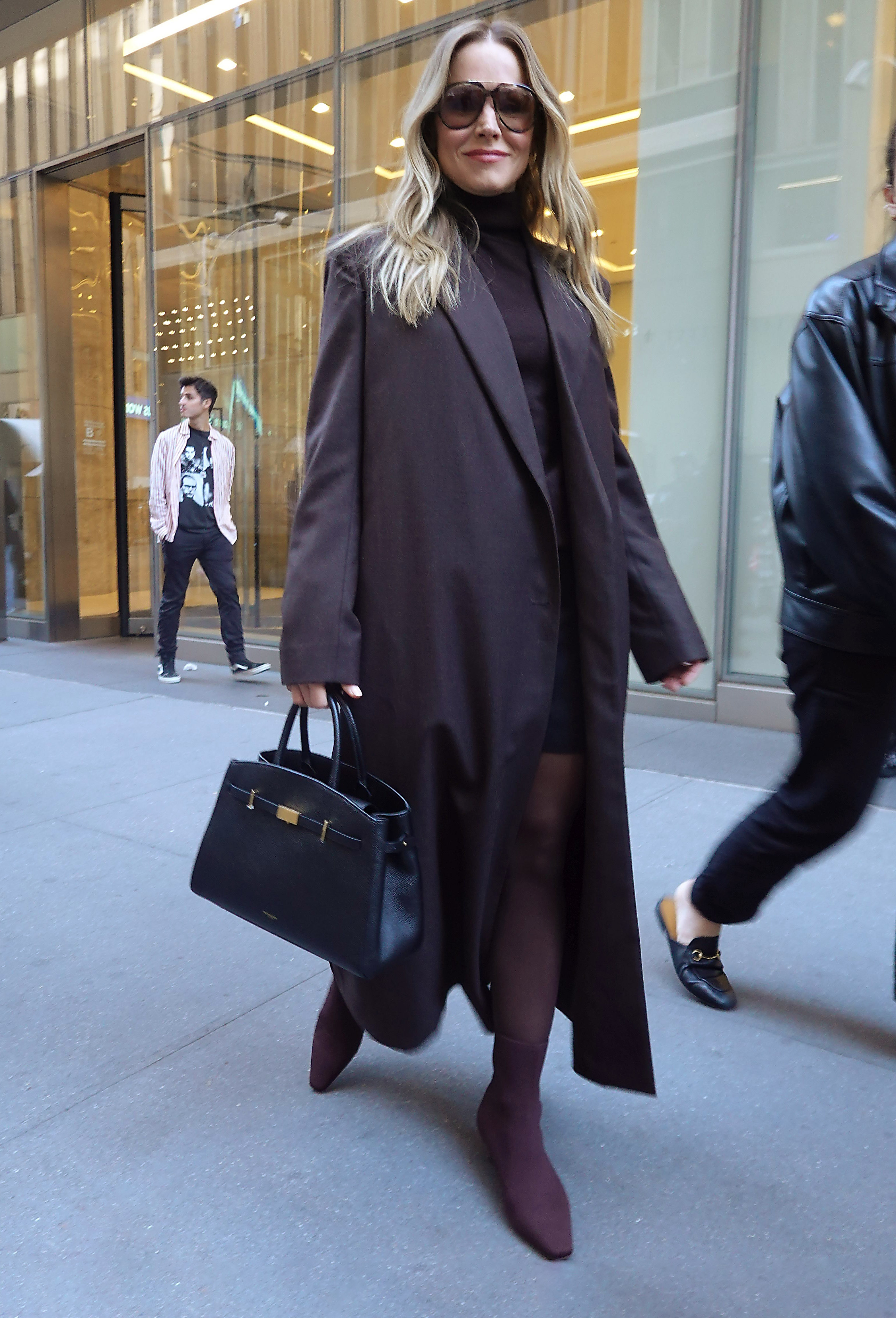 Kristen Bell was spotted in New York promoting Nobody Wants This in brown ankle boots