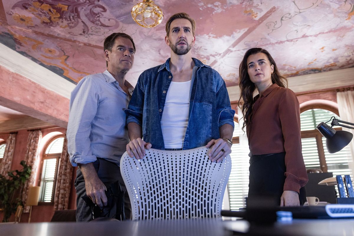 Tony and Ziva standing next to hacker Boris