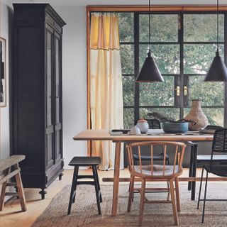 Kitchen diner with crittall windows and curtains