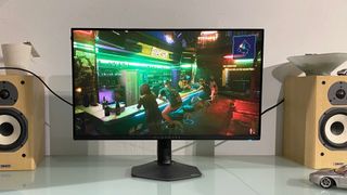 Alienware AW2725QF monitor with Cyberpunk 2077 open