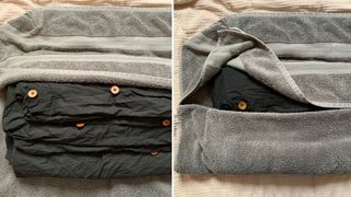 dark charcoal grey duvet cover wrapped in a grey towel as hack to show how to dry bed sheets fast without a dryer