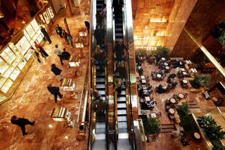 NEW YORK, UNITED STATES:shoppers and diners visit the Trump Tower on 5th Ave. in Manhattan 29 October, 2004. New York's Fifth Avenue and the Champs-Elysees in Paris are the most expensive add