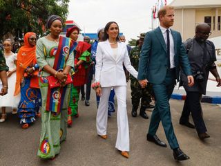 Prince Harry and Meghan Markle take part in a tour of Nigeria for the 10th anniversary of the Invictus Games