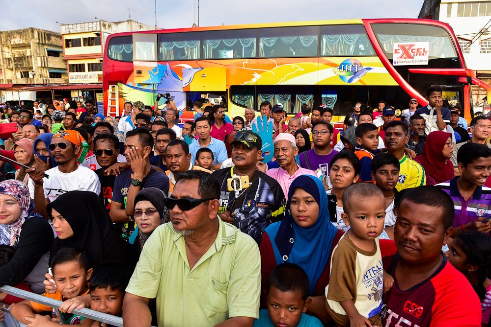 Spectators wait for the stage 3 finish at Tour de Langkawi