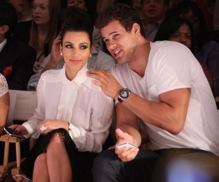 Kim Kardashian and Kris Humphries attends the Abbey Dawn by Avril Lavigne Spring 2012 fashion show during Style360