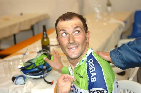 Basso gets cleaned up after winning the GP Carnago