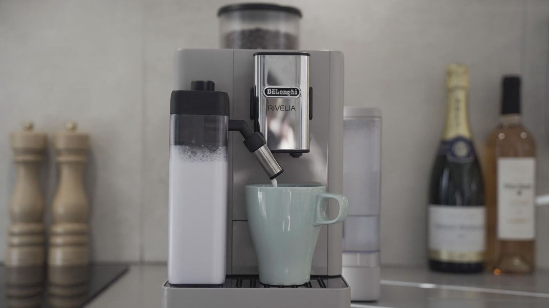 A front-facing view of the De'Longhi Rivelia on a worksurface