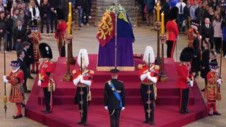 Queen Elizabeth II 's grandchildren (clockwise from front centre) Prince William, Peter Phillips, James, Earl of Wessex, Princess Eugenie, Prince Harry, Princess Beatrice, Lady Louise Windsor and Zara Tindall hold a vigil around the coffin of Queen Elizabeth II