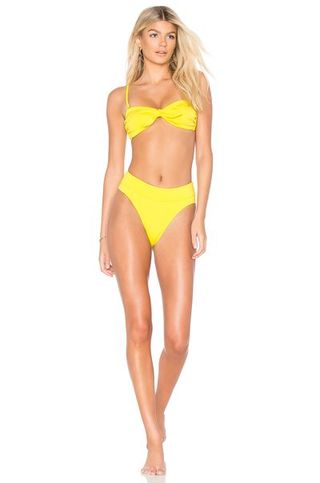 Clothing, Bikini, Swimwear, Monokini, Yellow, Undergarment, Swimsuit top, Swimsuit bottom, Briefs, One-piece swimsuit,