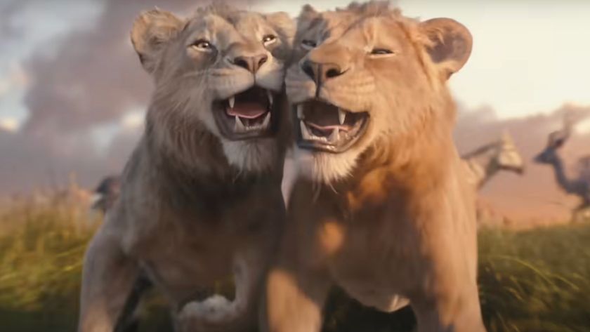 Mufasa and Taka smile as they run together in the wild in Mufasa: The Lion King.