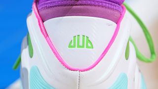 J-Dub Adidas logo pictured on the back of a sneaker