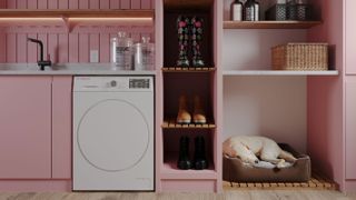 pink laundry room with dog bed