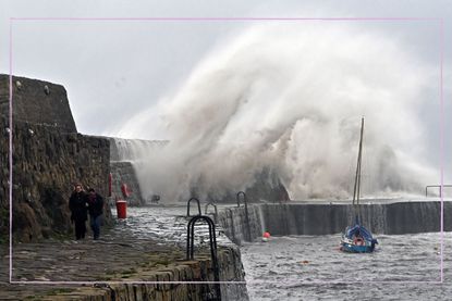 Wave breaking over a harbour during a storm