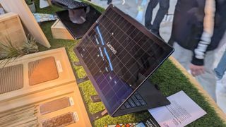 The Lenovo Yoga Solar PC concept laptop on Lenovo's expo stand at MWC 2025.