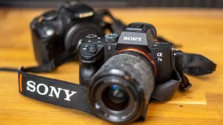 Sony A7 III in front of Canon EOS-350D