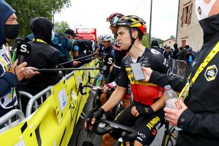 SAINTGAUDENS FRANCE JULY 13 Wout Van Aert of Belgium and Team JumboVisma meets the media press at arrival during the 108th Tour de France 2021 Stage 16 a 169km stage from Pas de la Casa to SaintGaudens Social distance Covid safety measures LeTour TDF2021 on July 13 2021 in SaintGaudens France Photo by Tim de WaeleGetty Images