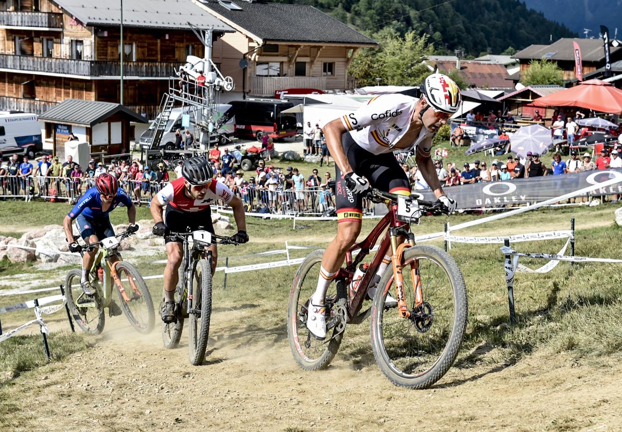 David Valero Serrano (Spain) leading Nino Schurter (Switzerland) and Luca Braidot (Italy)