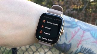 Amazfit GTS 3 worn on a wrist, showing off the workouts screen