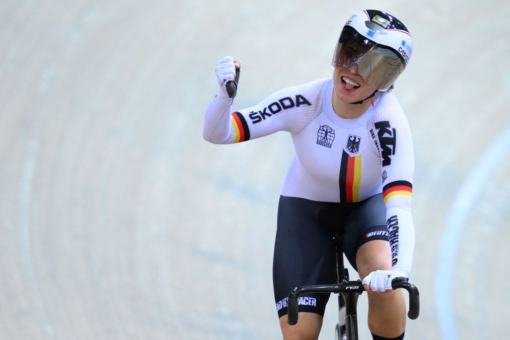 Germanys Emma Hinze celebrates while crossing the finish line to win the Womens Team Sprint finals during the UCI Track Cycling World Championships at the Velodrome of SaintQuentinenYvelines southwest of Paris on October 12 2022 Photo by AnneChristine POUJOULAT AFP Photo by ANNECHRISTINE POUJOULATAFP via Getty Images