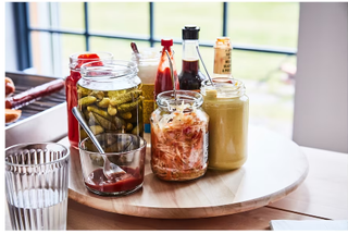 An IKEA lazy susan holding jars and condiments
