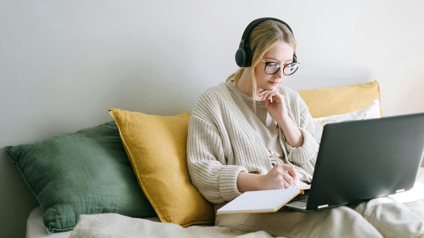 An image from Pexels of a woman working with headphones on