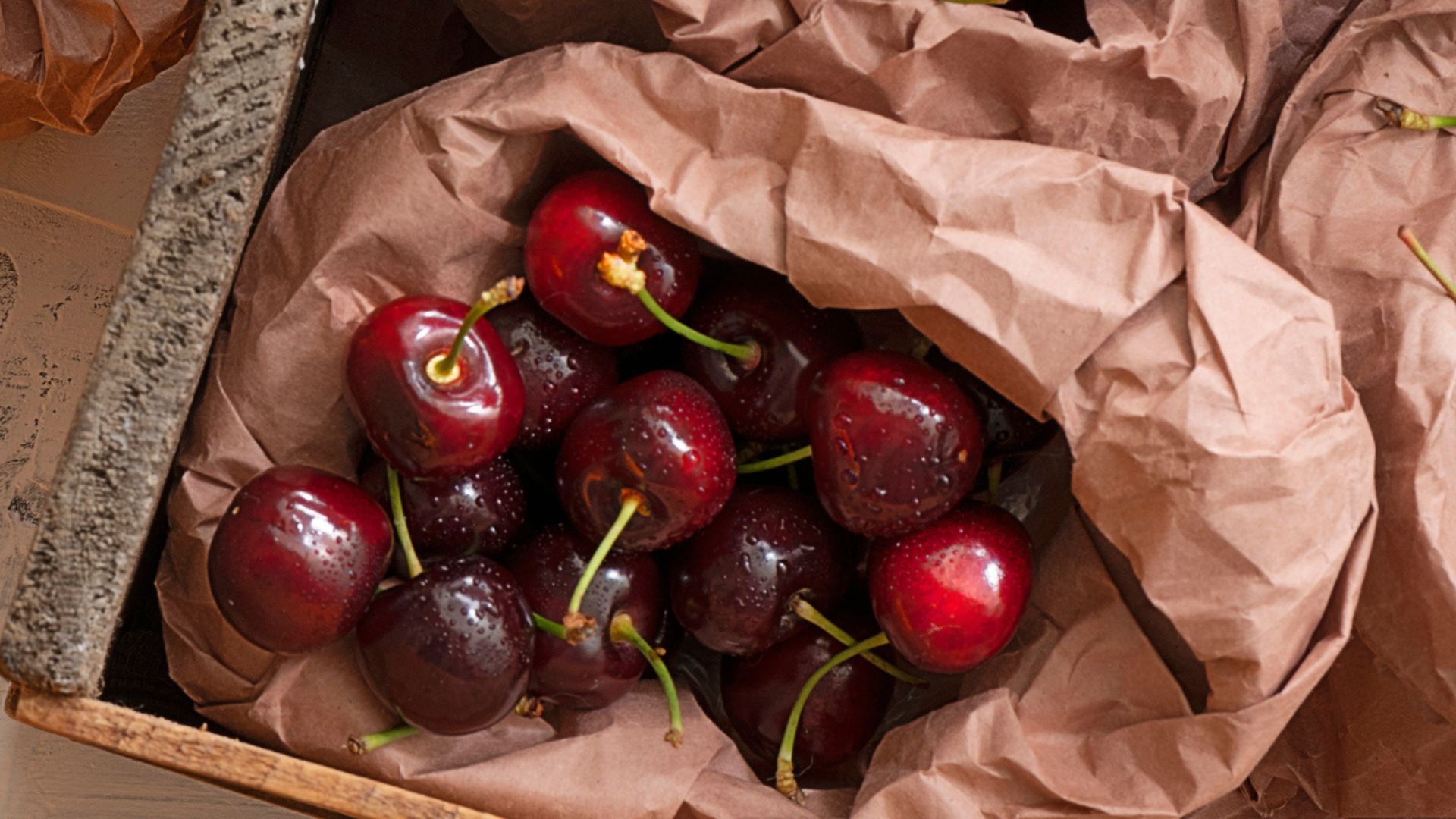 Brown bag of cherries