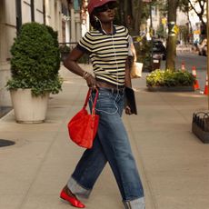 Woman in stripe top and jeans