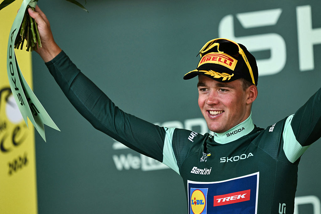  Mads Pedersen celebrates on the podium with the best sprinter's green jersey at the Tour de France