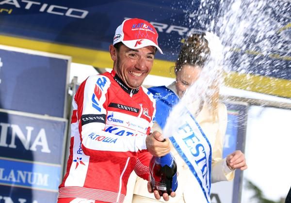 Joaquim Rodriguez lets the champagne fly