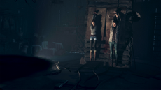 Until Dawn on PS5 – two teenagers hanging from hooks as a murderer closes in