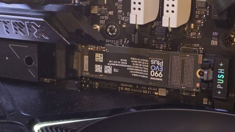 Samsung 990 Evo Plus installed inside a gaming PC&#039;s NVMe M.2 slot.