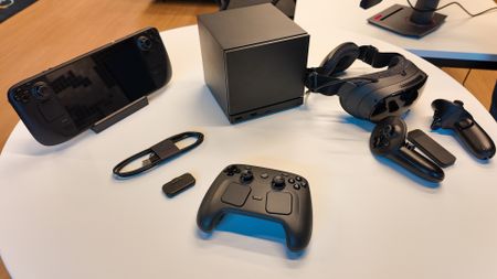 The Steam Deck alongside Valve's three new products: the Steam Machine, Steam Frame, and Steam Controller.
