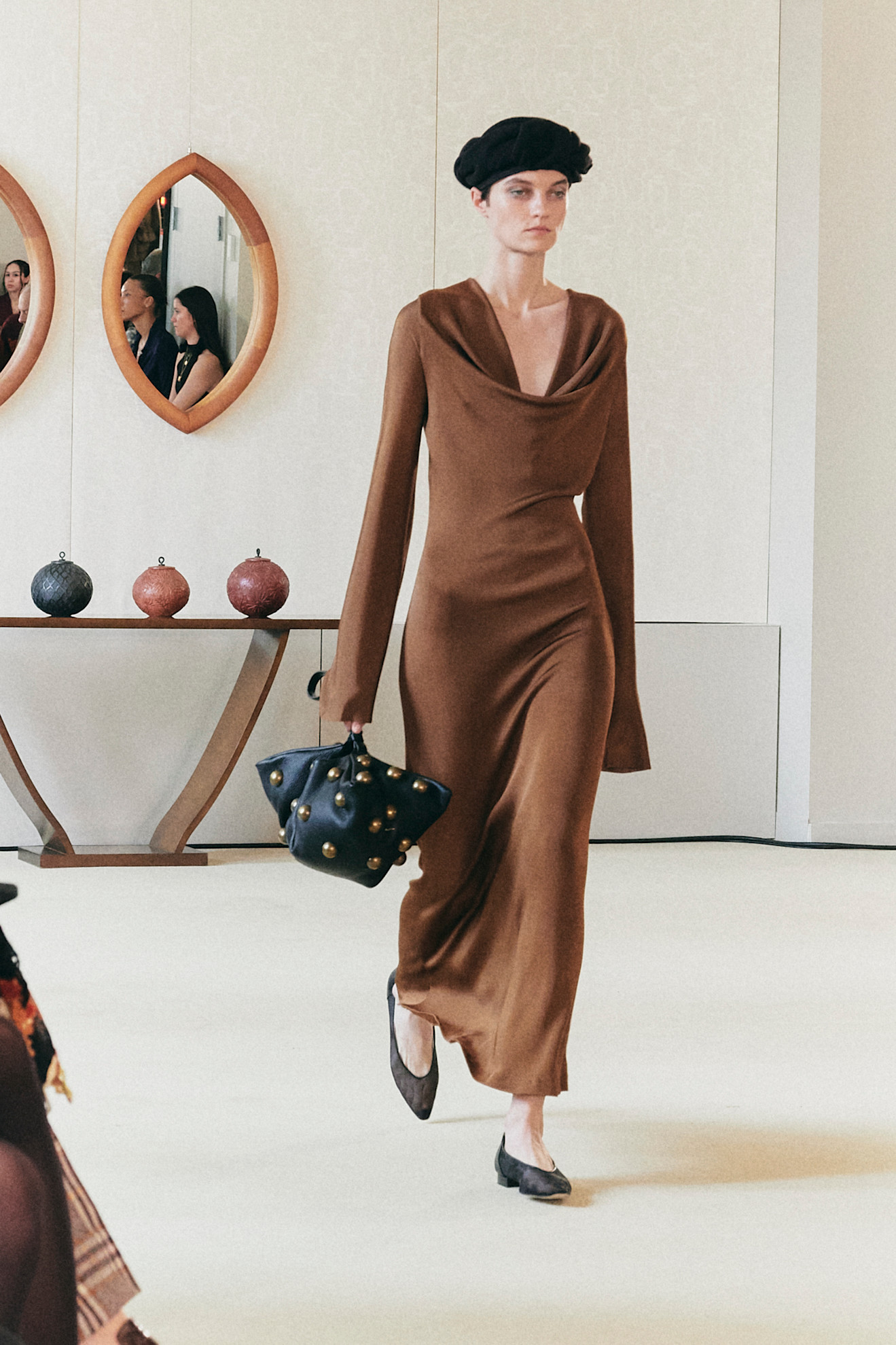 Model walking in Altuzarra Fall Winter 2025 show.