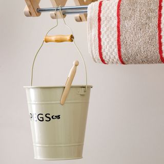 laundry peg bucket on drying airer