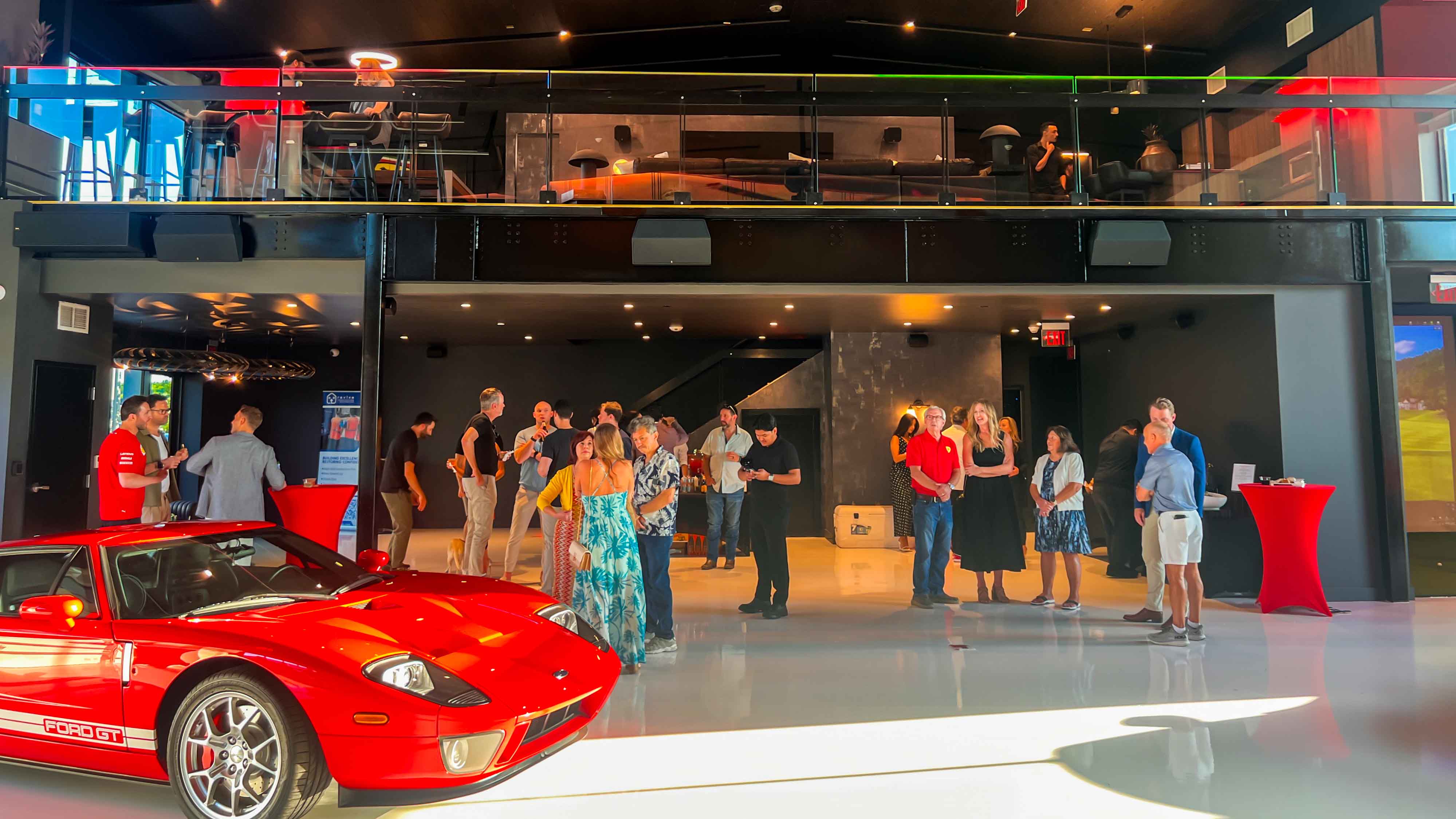 A private car condo in Texas with a red sports car shining after a cleaning.