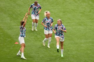 Ella Toone, Alessia Russo, Chloe Kelly and Fran Kirby of England warm up prior to the UEFA Women's Euro 2022 final match between England and Germany at Wembley Stadium on July 31, 2022 in London, England.