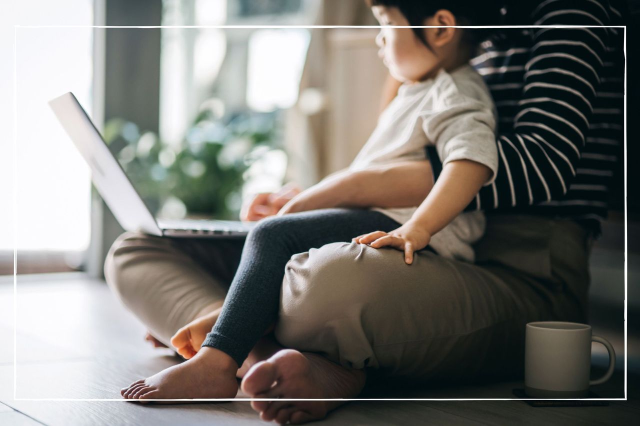 Mother working from home with and looking after child