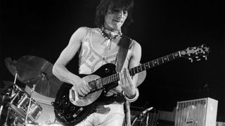 Ron Wood with The Faces, performing live onstage, playing Zemaitis guitar