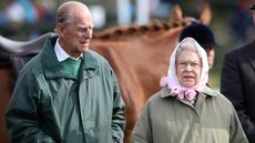 Prince Philip, Duke of Edinburgh and Queen Elizabeth II attend day 3 of the Royal Windsor Horse Show on May 10, 2013 