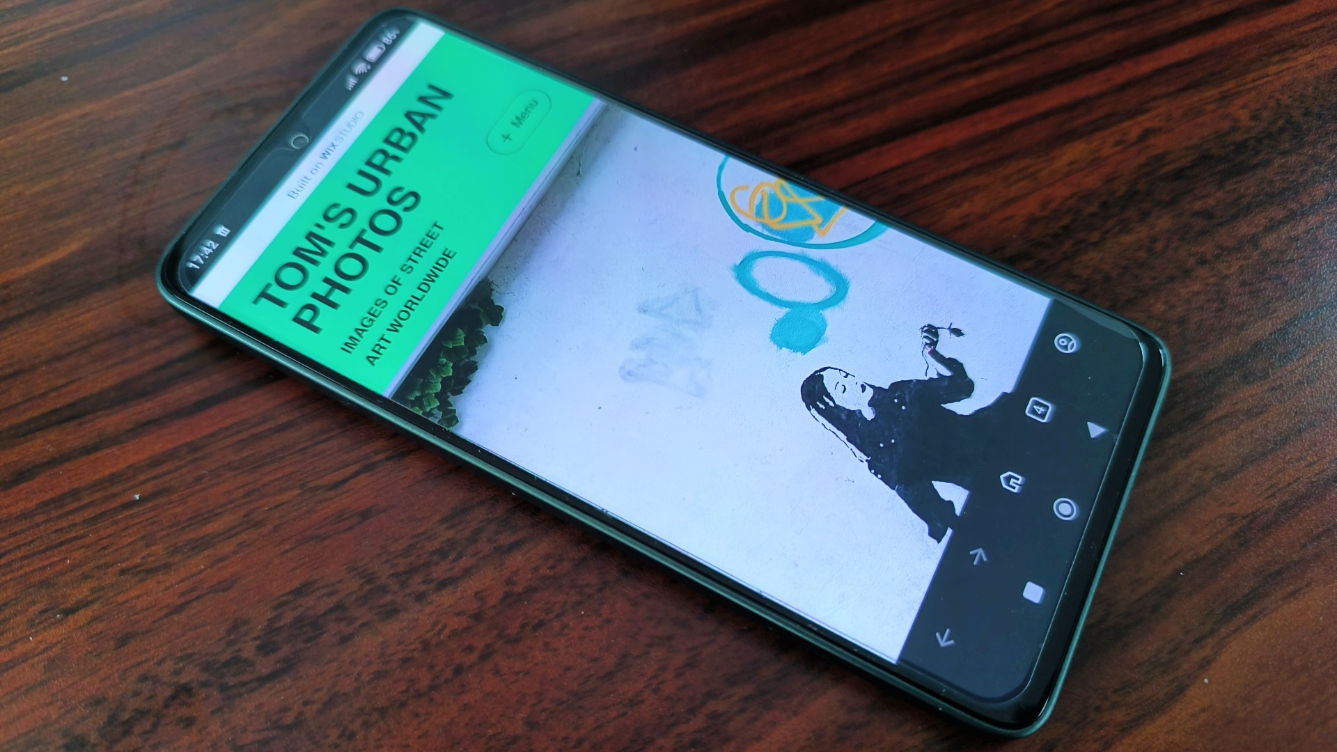 Photo of Wix Studio interface on smartphone screen