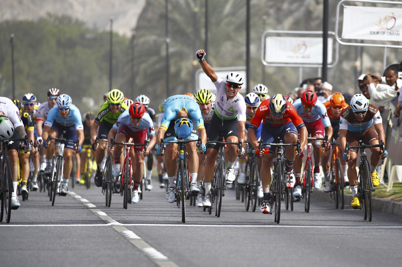 A Dimension Data teammate celebrates as Nizzolo wins