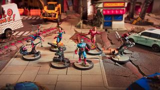 The heroes of the new Marvel: Crisis Protocol core box stand together in the middle of a ruined street