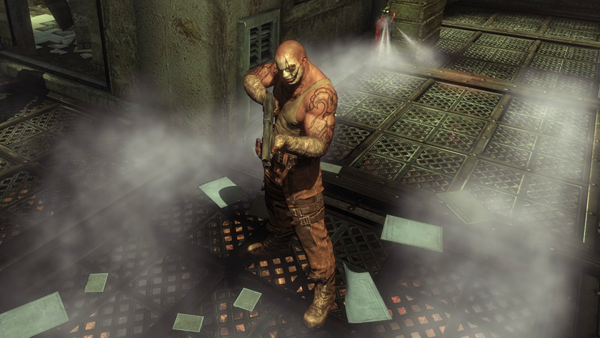 PhysX effects enabled in Batman: Arkham City, with a man stood in fog and surrounded by papers.