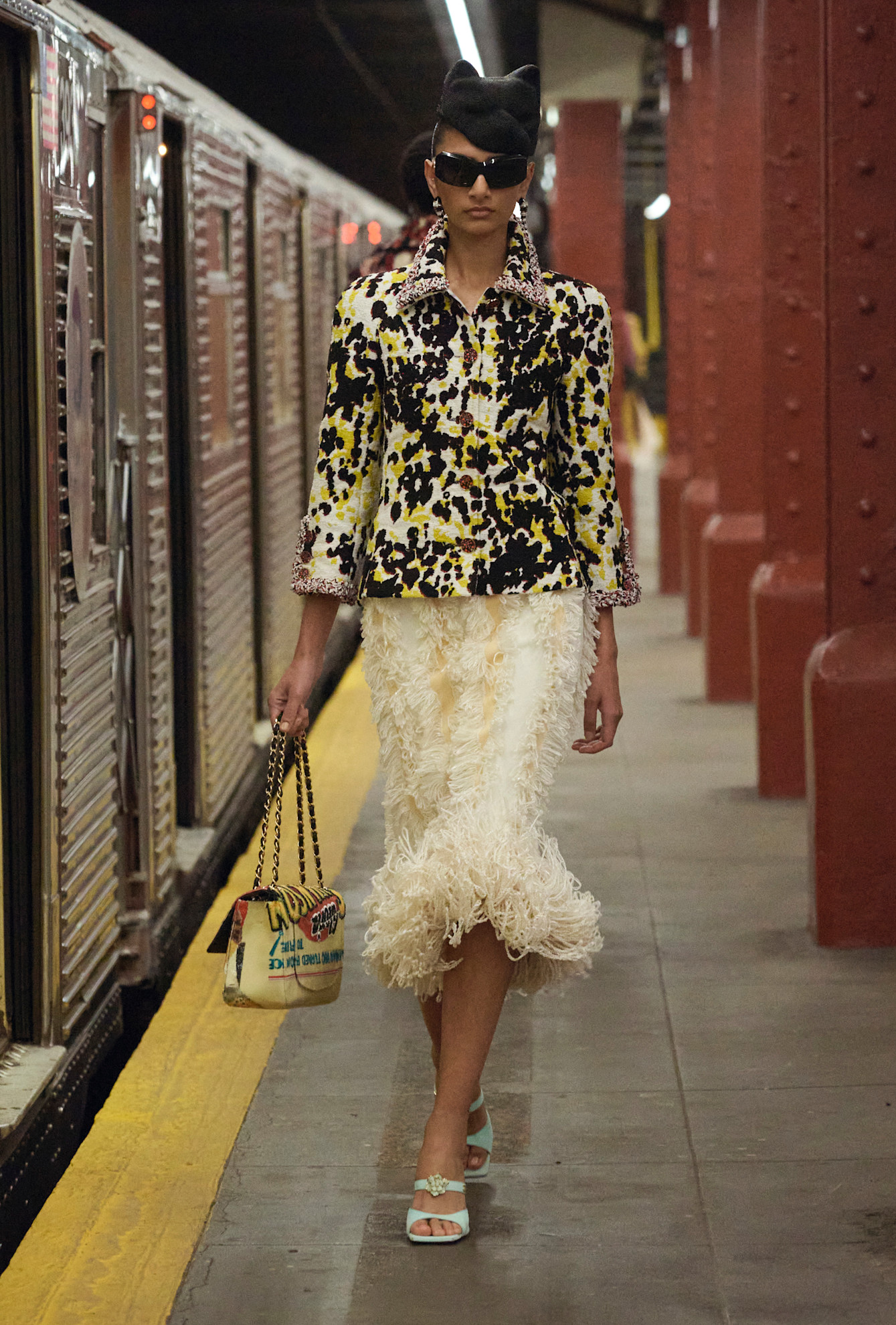 models walk the subway runway for the chanel metiers d'art 2026 show in new york city