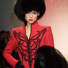 A model wears an outfit from the Bob Mackie Fall 2001 collection February 16, 2001 on the last day of Mercedes-Benz Fashion Week at Bryant Park in New York City. 