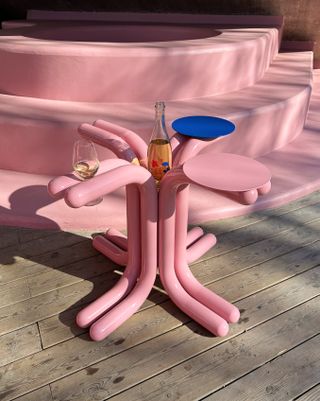 A pink abstract wine table