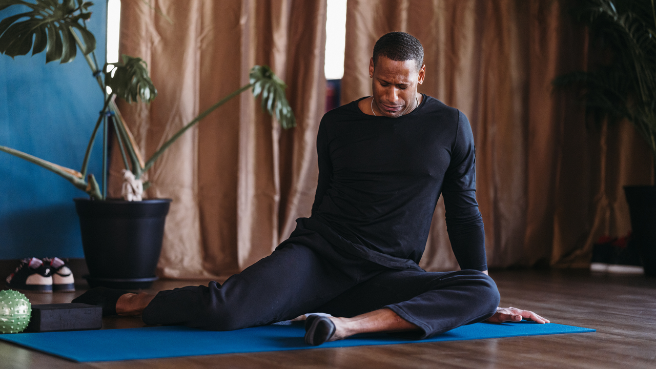 Man doing hip mobility exercise